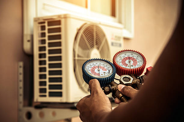 Professional Hvac technician working in Mulga, AL